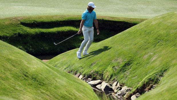 Tommy Fleetwood near Rae’s Creek on the 13th hole at Augusta National.