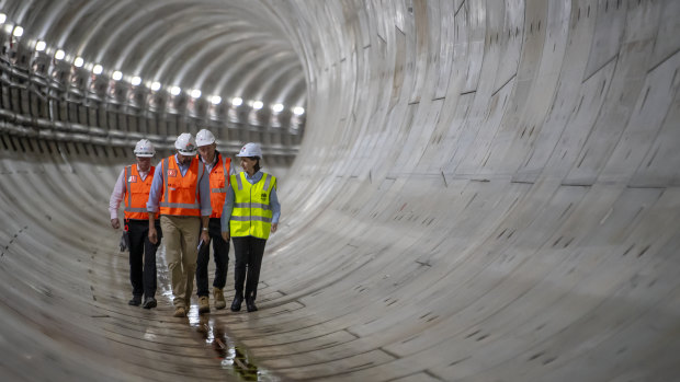 Premier Gladys Berejiklian inspects the first of two metro railway tunnels deep under Sydney Harbour.