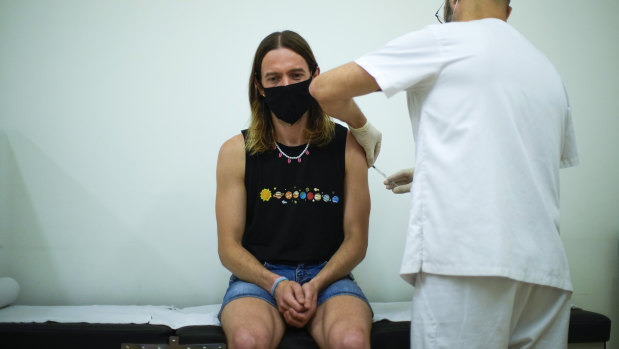 A resident receives a vaccine against Monkeypox in Barcelona, Spain. The country has recorded the first death from the disease in Europe.