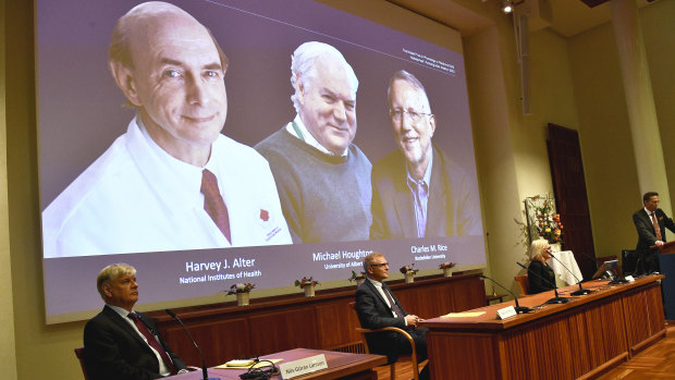 Harvey J. Alter, far left, Michael Houghton and Charles M. Rice were awarded the Nobel Prize in medicine and physiology.
