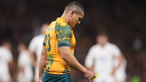 Wallabies back Izaia Perese leaves the field after being shown a yellow card for a controversial deliberate knockdown.