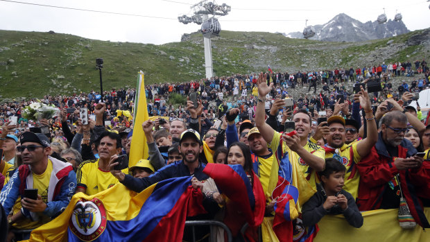 Supporters of Colombia celebrate a first-ever Colombian Tour de France win-to-be.