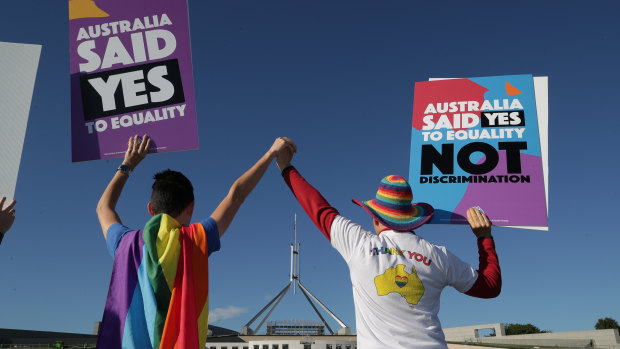 Supporters of same-sex marriage at a rally on the front lawn of Parliament House. 
