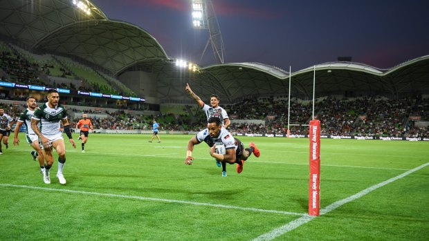 Low-flying: Josh Addo-Carr goes over for the Indigenous side.