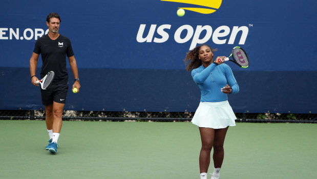Common practice: Serena Williams with her coach Patrick Mouratoglou at last year's US Open.
