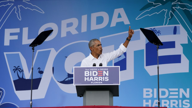 Former president Barack Obama speaks as he campaigns for Democratic presidential candidate former Vice President Joe Biden at Florida International University.