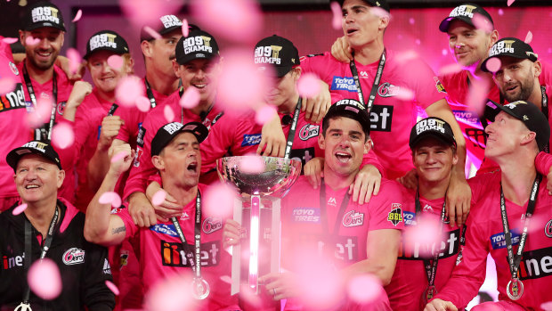 The Sydney Sixers celebrate winning last summer's BBL.