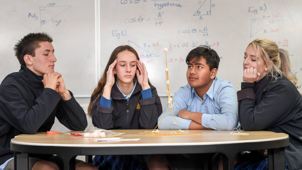 Frankston High School students build a tower with 24 sticks of spaghetti, one metre of tape and string. A marshmallow has to sit on the top. Left to right: Kye Munnikhuis, Keily Blackley, Sam Lutfi and Yasmin Hume.