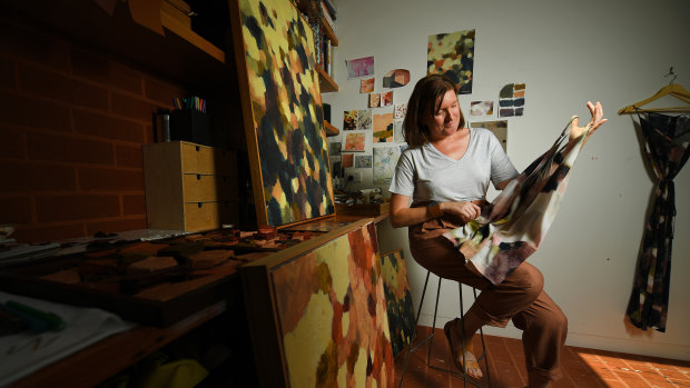 Artist Hannah Fox in her Melbourne studio. Her designs have been worn by prominent women including New Zealand Prime Minister Jacinda Ardern. 