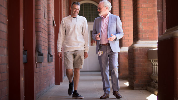 Adam Daly with his doctor St Vincent’s director of neurology Professor Mark Cook. 