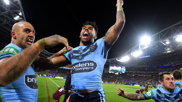 Blake Ferguson, Josh Addo-Carr and Mitchell Pearce celebrate winning Game 3.