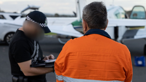 Police allege that three of the five men men provided ground support for the flight and had staged themselves in Queensland since February.