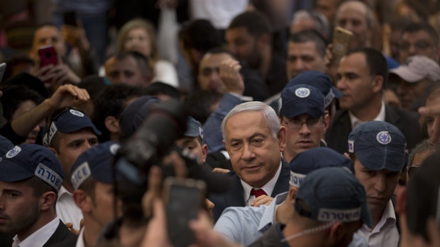 Israeli Prime Minister and head of the Likud party Benjamin Netanyahu at a market in Tel Aviv.