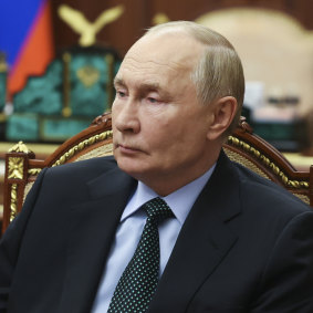 Putin listens to head of Russian-controlled Zaporizhzhia region of Ukraine, Yevgeny Balitsky during their meeting at the Kremlin.