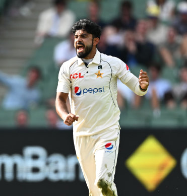 Aamir Jamal celebrates a wicket.