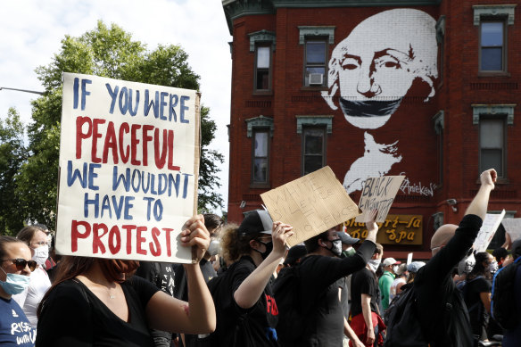 Demonstrators march to protest the death of George Floyd in Washington. 