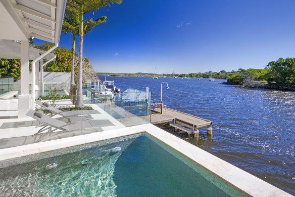 The two-level luxury house at Noosa Heads has four bedrooms.