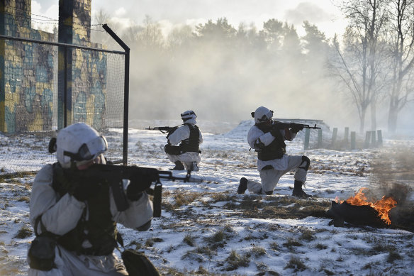 Russian troops, seen here before the invasion of Ukraine, appear to be badly in need of reinforcements.