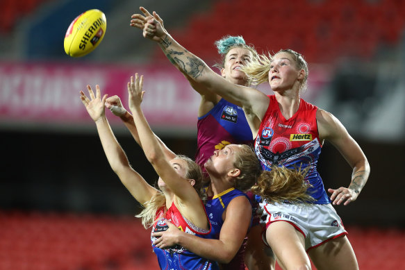Tayla Harris attempts a mark in Melbourne’s season six round seven win against Brisbane.