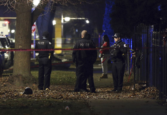 Chicago police at the scene of a shooting on Sunday.