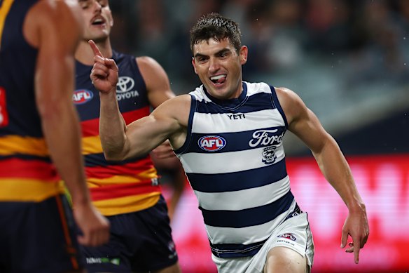 Shaun Mannagh of the Cats celebrates a goal.