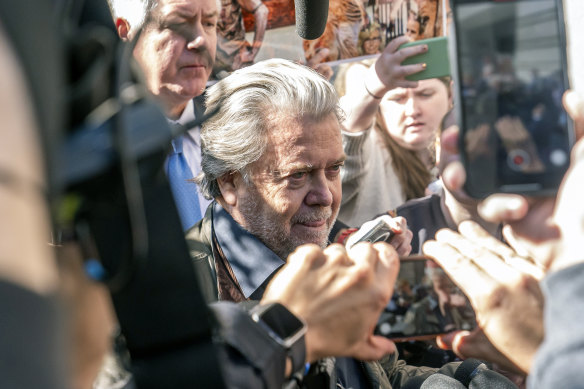 Steve Bannon, centre, a longtime ally of former President Donald Trump and convicted of contempt of Congress, leaves the federal courthouse in Washington. 