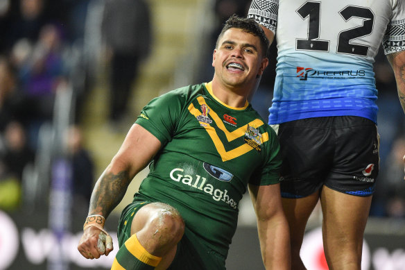 Latrell Mitchell scores his first try for Australia.