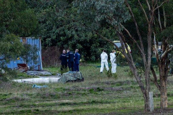 Investigators at the scene on Monday night.