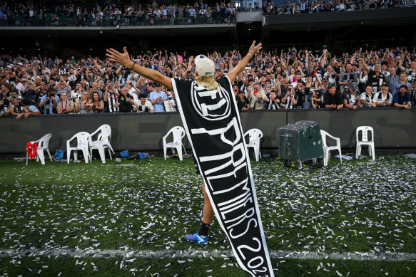 Darcy Moore celebrates with the Collingwood faithful.