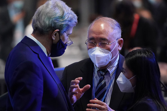 US Special Presidential Envoy for Climate John Kerry speaks with Special Climate Envoy of China Xie Zhenhua on the final day of the summit. 