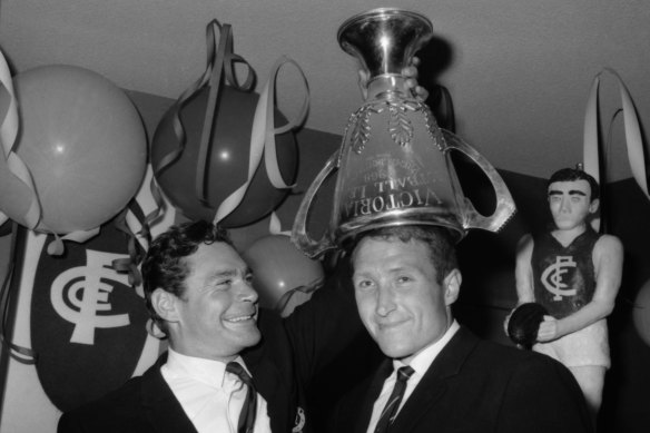 Barassi with Carlton captain John Nicholls after the Blues won the 1968 VFL grand final, the club’s first for 21 years. 