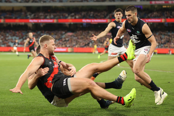 Jake Stringer is tackled by Sam Docherty.