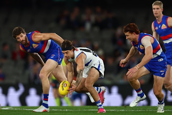 Jy Simpkin takes the ball.