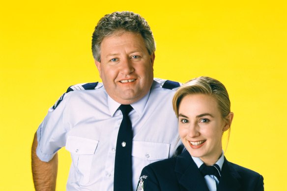 McCune with John Woods in a publicity shot for the long-running drama Blue Heelers.