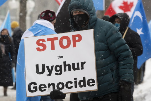 Protesters decry China’s treatment of Muslims Uighurs outside Parliament in Ottawa, Canada.