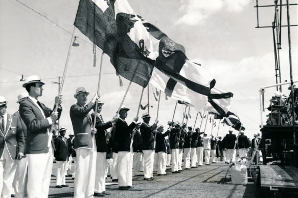 Flag bearers in the march past at the opening of the Perth Empire Games.