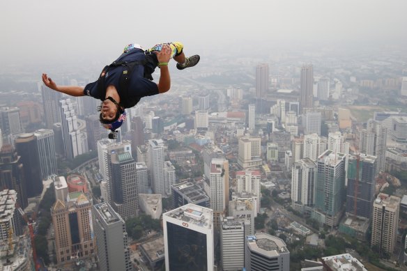 Reffet leaps from the deck of Malaysia's Kuala Lumpur Tower in 2013. 