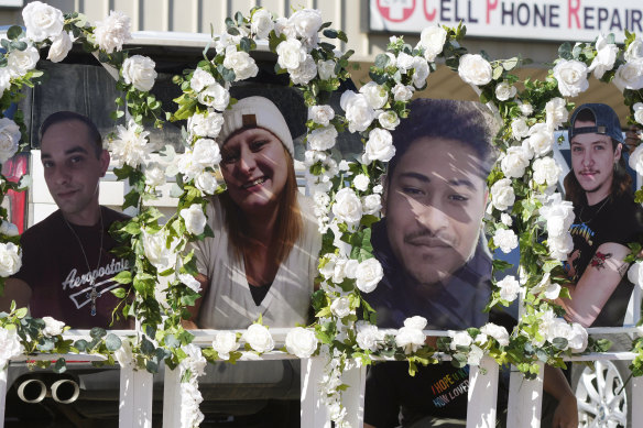 Photographs of victims of a mass shooting at a gay nightclub are displayed at a memorial on November 22 in Colorado.