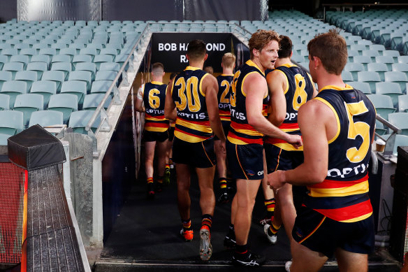 Rory Sloane of the Crows walks from the field during the round 1 AFL match between the Adelaide Crows and the Sydney Swans at Adelaide Oval on March 21, 2020.