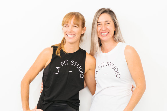 Claire Chidgzey (left) with co-founder Jaye Cuypers. Their LA Fit fitness studios in Highgate and Subiaco have been forced to stop their indoor classes.