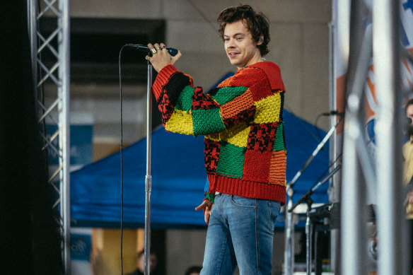 Piece of the pandemic ... Harry Styles wearing the JW Anderson cardigan that became an online sensation. 