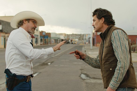 Joaquin Phoenix (left) and Pedro Pascal face off in Eddington.
