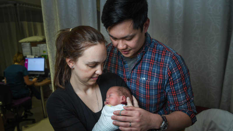 Josh and Libby with their son James, who was born the size of a 22-week-old baby. 