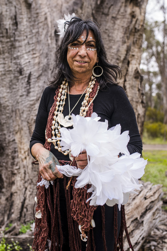 Glenda Nicholls with some of her feather flowers for Miwi Milloo, or Good Spirit of the Murray River, commissioned NGV Triennial 2020.
