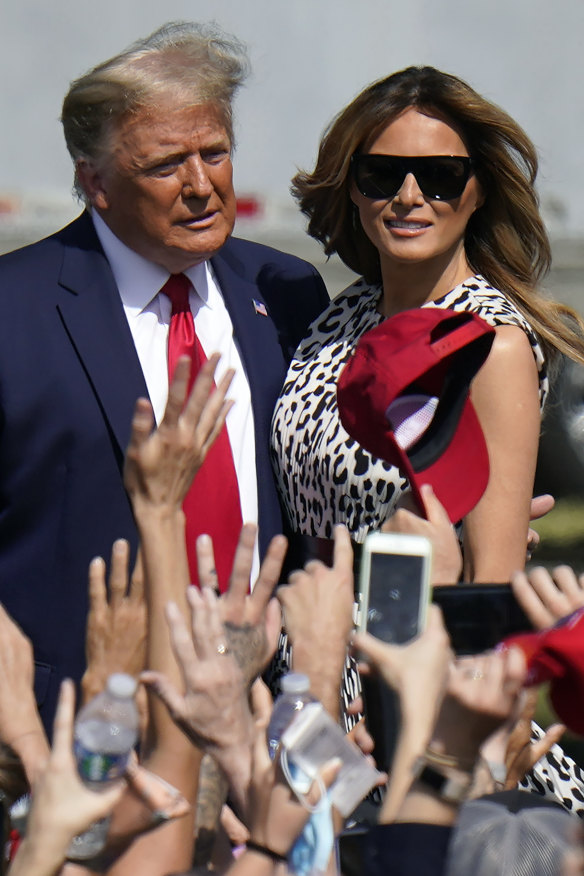 President Donald Trump and first lady Melania Trump arrive for a campaign rally in Tampa, Florida.