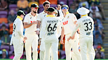 Mitchell Starc of Australia celebrates with teammates.