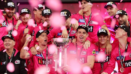 The Sydney Sixers celebrate winning last summer's BBL.