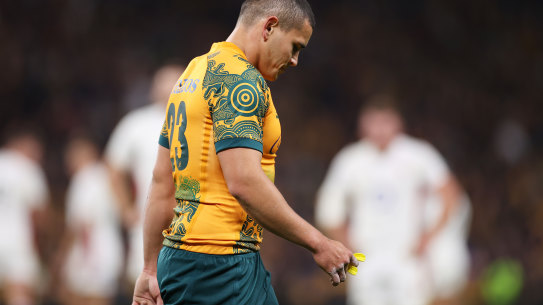Wallabies back Izaia Perese leaves the field after being shown a yellow card for a deliberate knockdown