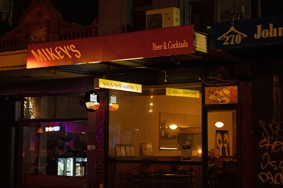 Mikey’s is a new bar in Abbottsford featuring a martini stained-glass window (right).
