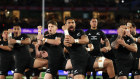 The All Blacks perform their traditional pre-match haka before a test against the Wallabies last year.